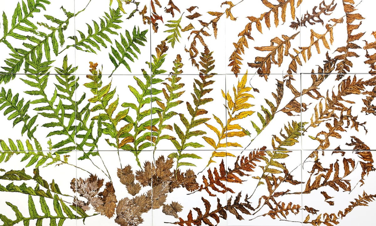 Green, yellow, ochre, and brown staghorn-fern fronds cross the seams of twelve white panels, with white gaps between the supports.