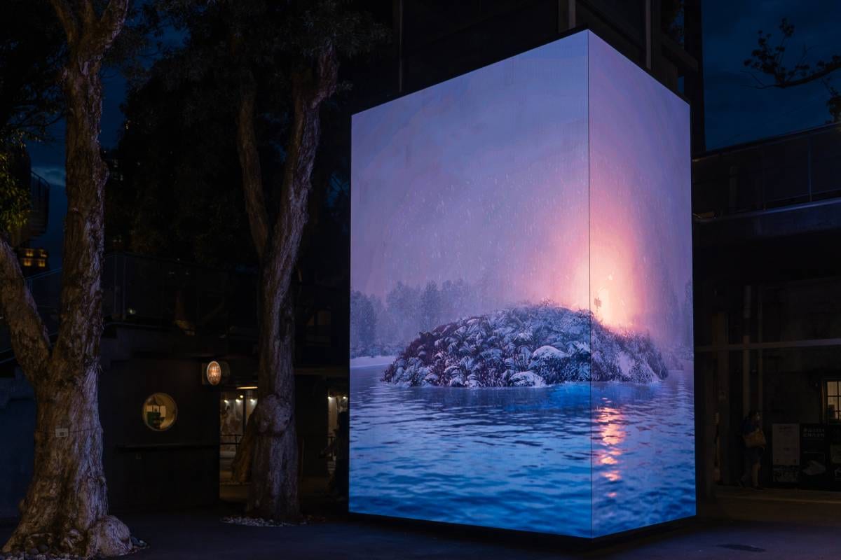 A freestanding Huashan screen wrapped in snow, water, and pink fire.