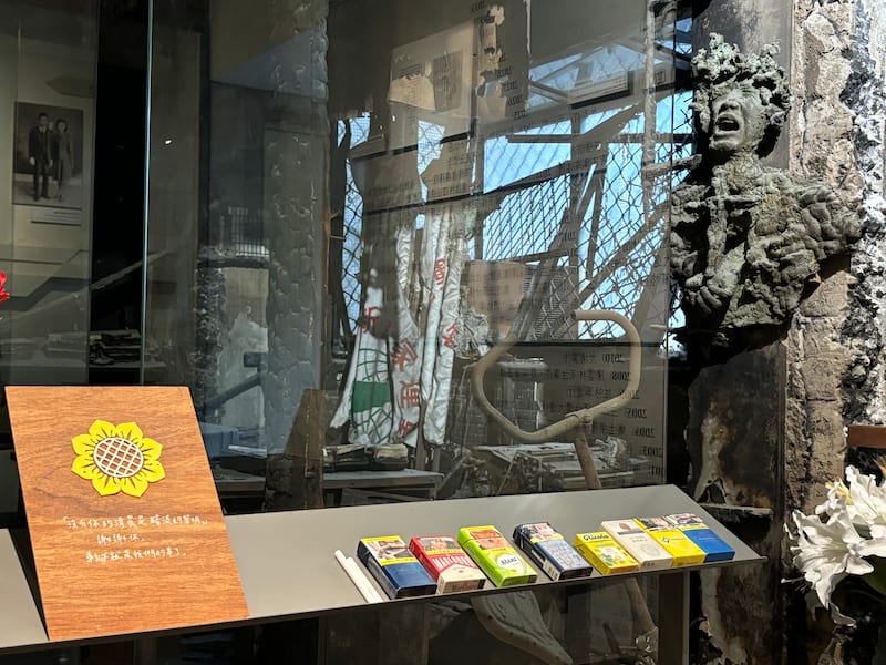 Unopened packs of cigarettes left on the glass outside the editor-in-chief's room.